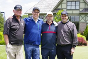 People participating in the 22nd annual gold fore grandview kids charity golf classic