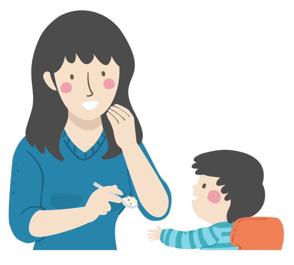 Illustration of a mother gesturing to eat food with her left hand while she feeds her infant son with a spoon in her left hand.