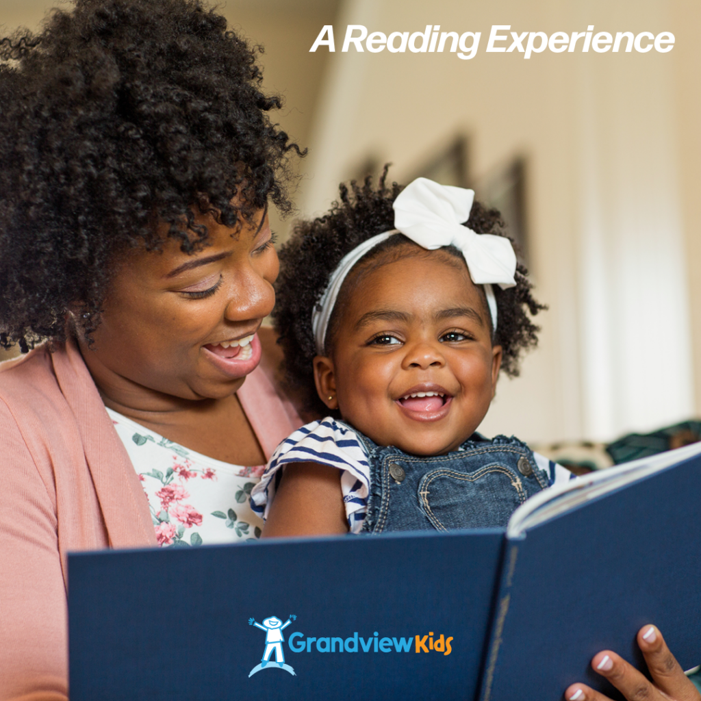 A mother reading to her smiling daughter