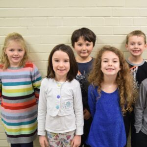 Group of kids smiling for the camera