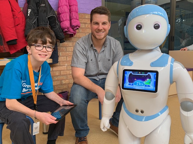 Joy the robot interacting with people at Grandview in Oshawa