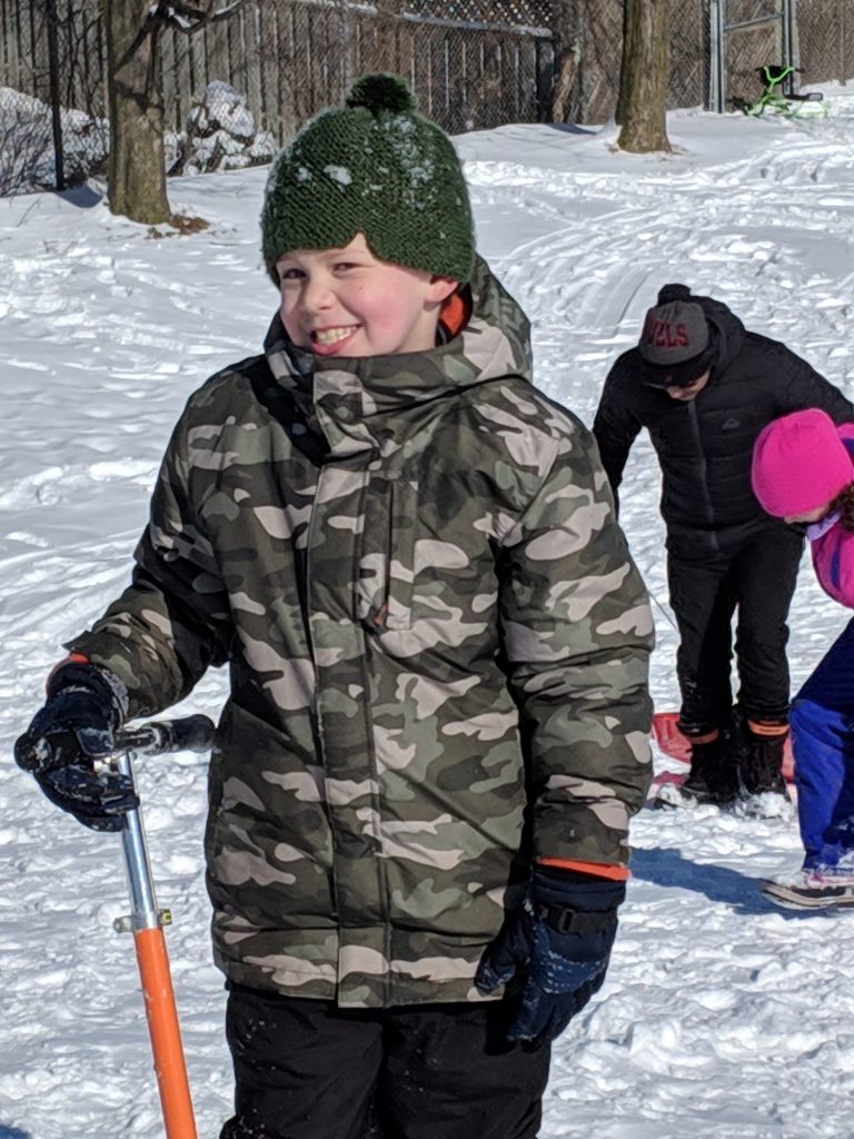 A photo of Gavin in the snow.