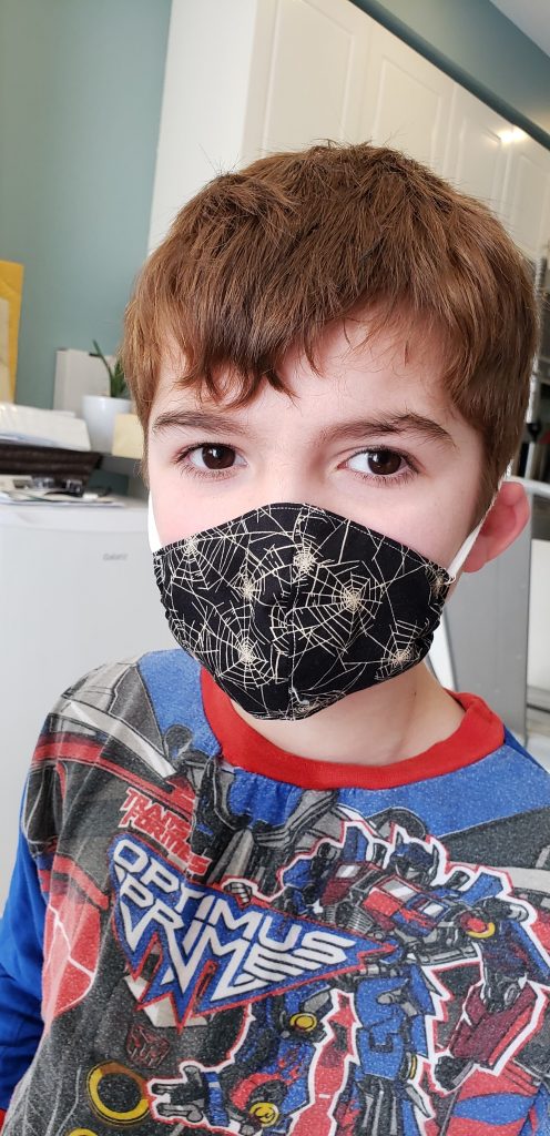 A child wearing a face mask.