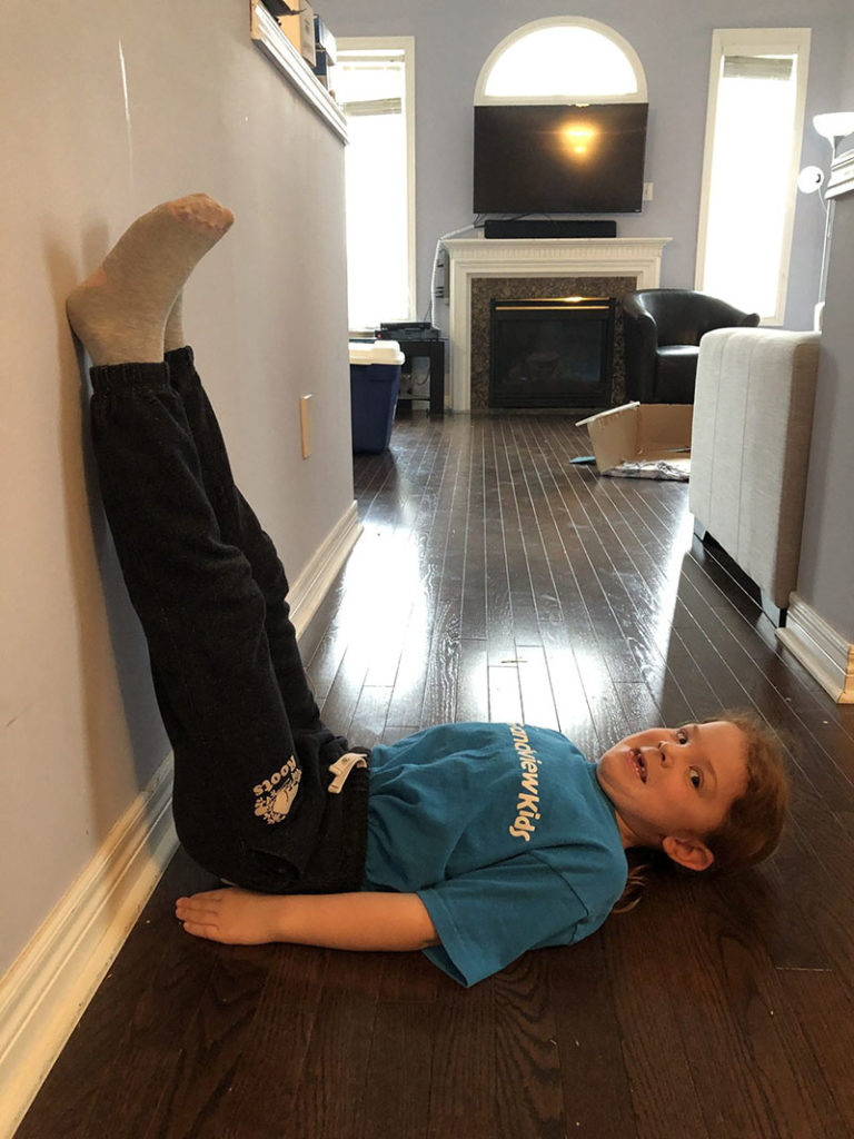 Girl stretching on floor