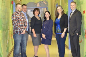 Grandview CEO Lorraine Sunstrum-Mann posing with NDP Party Canadidates