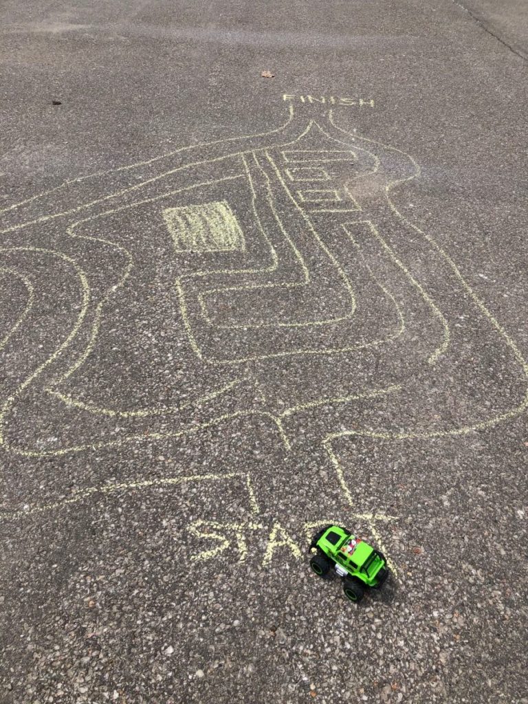 A picture of a sidewalk chalk maze